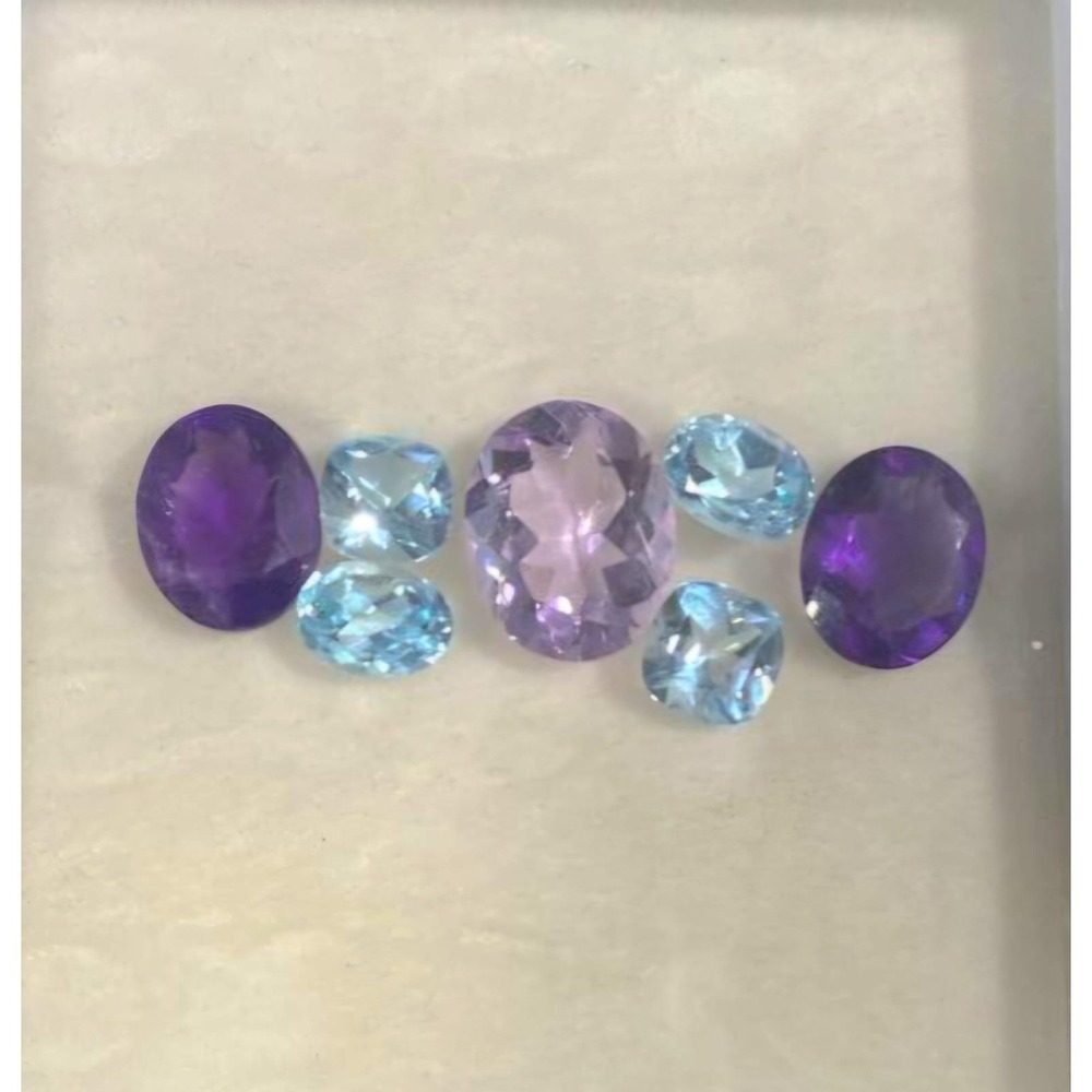 Amethyst & blue topaz bracelet, 7 faceted stones, silver artisan-made setting.